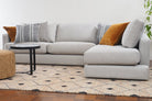 Sandringham sofa angled view with caramel cushions